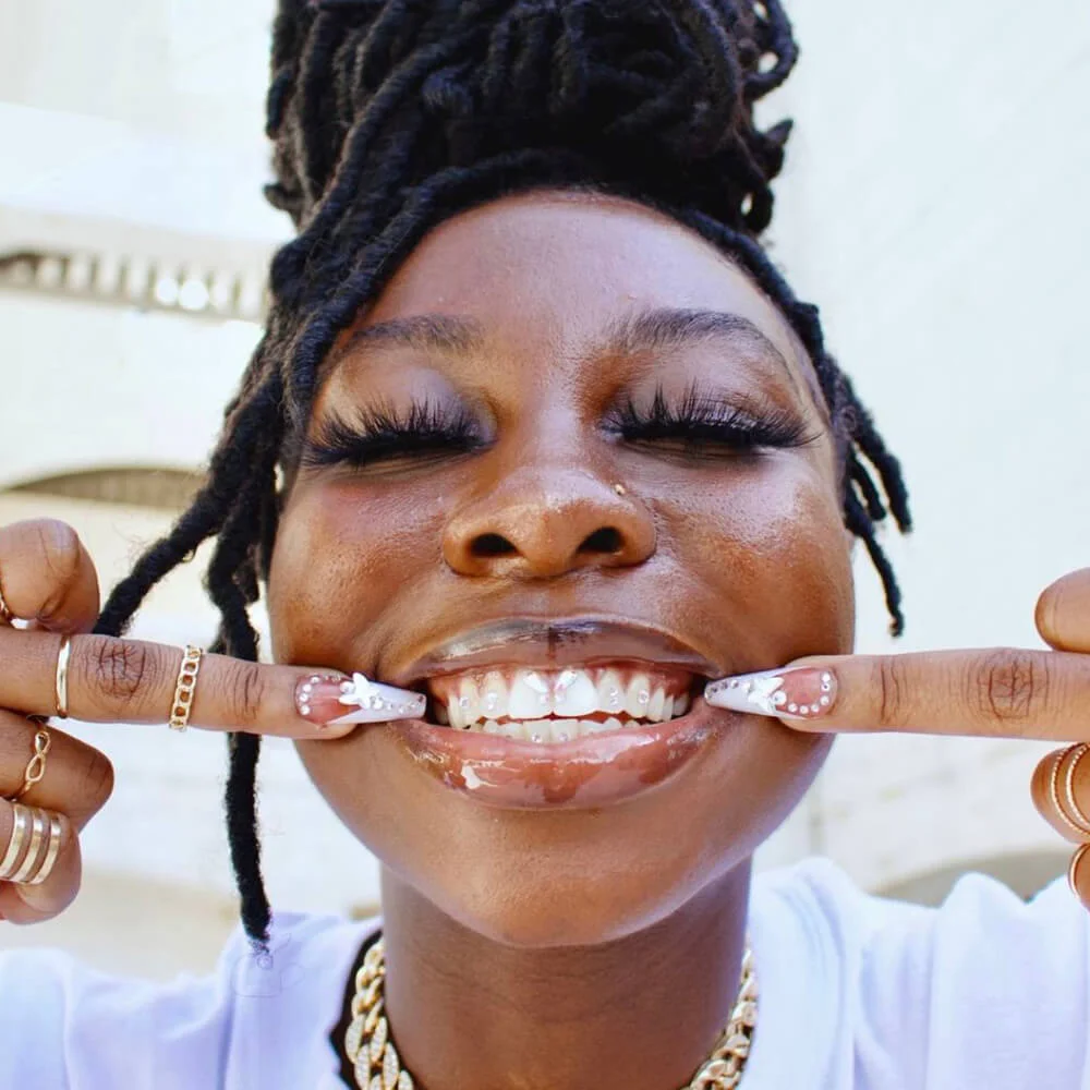 Close-up of a bright beaming smile after a Beam Confident treatment